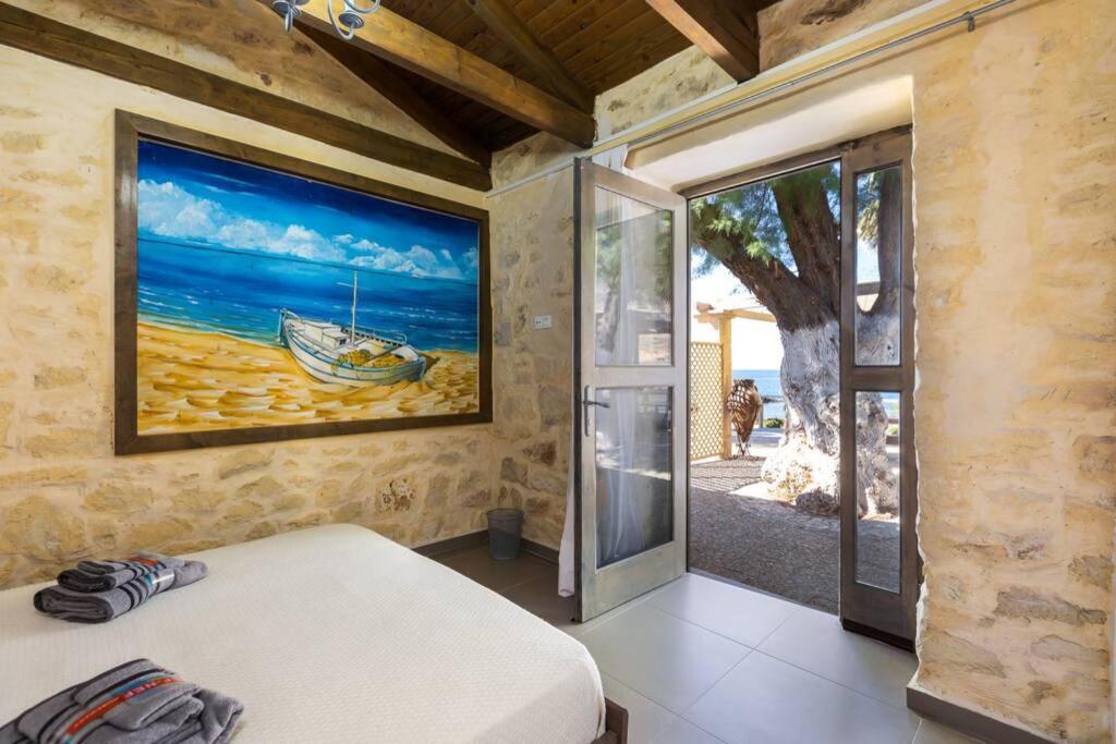 Villa Proto Helidoni - A Cozy Beachfront Villa Petres  Exterior foto